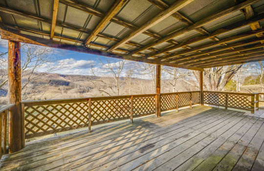 wood cabin front porch, covered front porch, mountain views