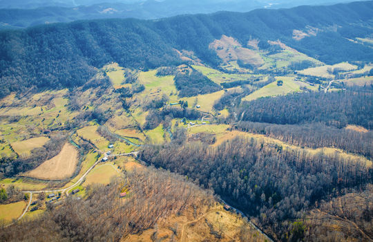 aerial view of property, mountain views