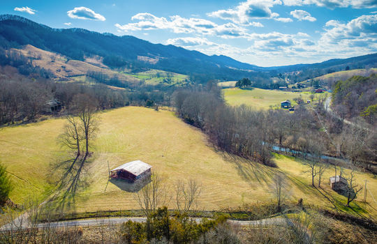 aerial view, barn, pasture, fence, mountain views
