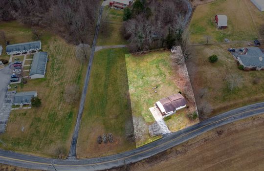 aerial view of home, property outline, front yard, back yard