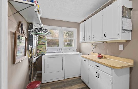 laundry space, cabinets, washer/dryer hookup, countertops
