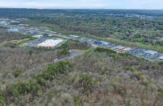 48+/- acres, Stone Drive, Kingsport, undeveloped land, trees, businesses, Road, four lane, aerial photo, mountain views