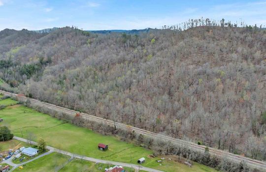 land, aerial view, trees, clearing, neighboring property, mountain views, 14.75+/- acres