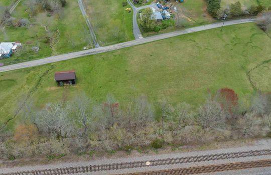 aerial view of land across road, outbuilding 14.75+/- acres