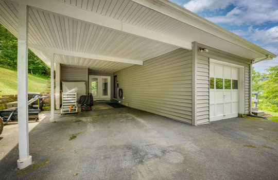 carport, exterior door, garage, garage door