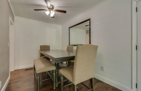 dining room space, luxury vinyl flooring, ceiling fan