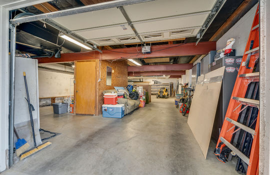 garage, concrete flooring, garage door
