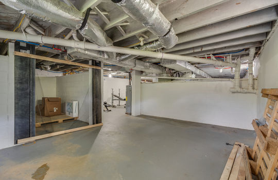 Full unfinished basement, concrete flooring