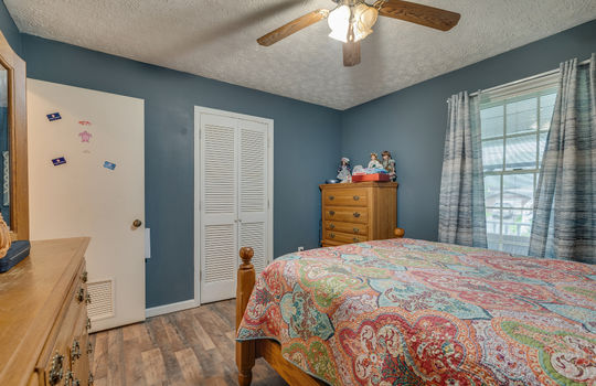 bedroom, vinyl flooring, ceiling fan, window, closet