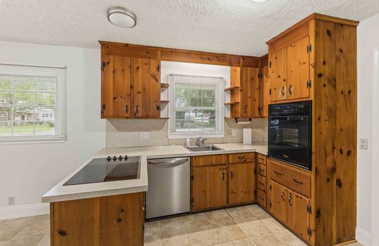 Kitchen, cabinets, cooktop, dishwasher, wall oven, window above sink