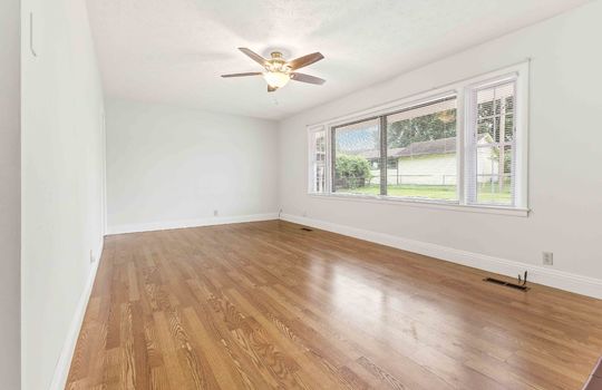 living room, hardwood flooring, picture window