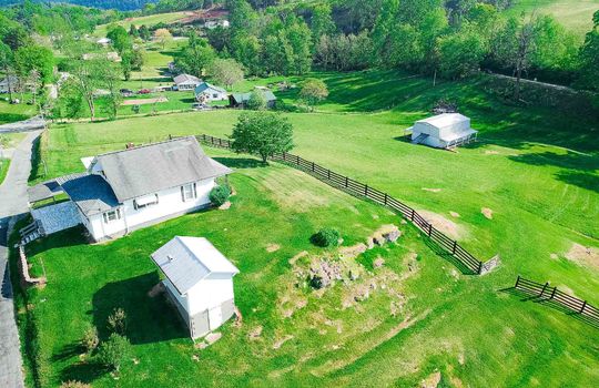 aerial view of farmhouse, shed, and barn, 3+/- acres, yard, trees, mountain(s)