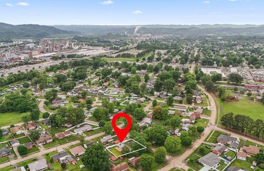 Aerial view of home in neighborhood, streets, property outline, property marker