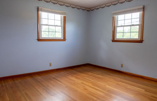 bedroom, windows, hardwood flooring
