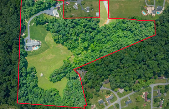 25.72+/- acres, aerial view, home, pasture, woods, road, property outline