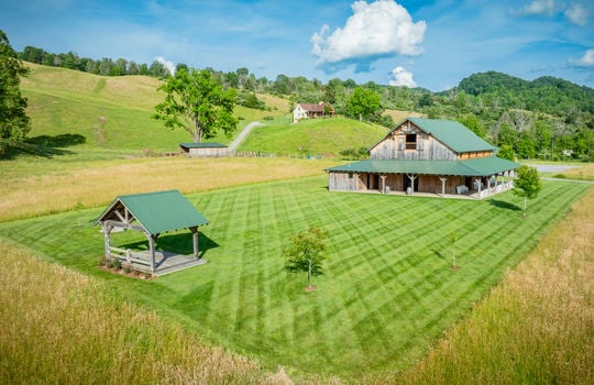 Event venue barn, yard, pasture, driveway, craftsman style home, rolling landscaping, 198.92+/- acres