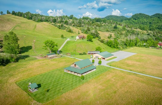 event venue, metal hay barn, pole barn, craftsman style home, yard, driveway, event venue parking, trees, landscaping, mountain views 198.92+/- acres