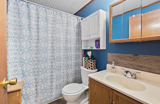 bathroom, shower/tub, toilet, sink, medicine cabinet