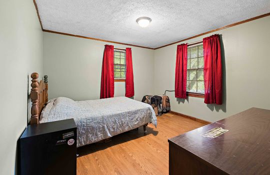 second bedroom, vinyl flooring, windows