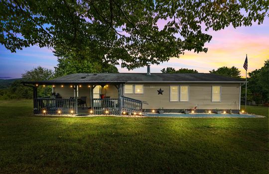 twilight photo, front yard, covered front porch, doublewide, vinyl siding