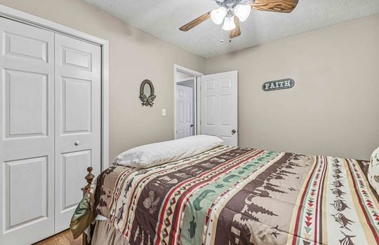 bedroom, closet, bed, ceiling fan, furnished, hardwood flooring