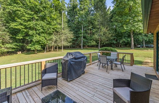 back deck, wood deck, wood railing, back yard, trees