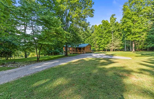 for lease only, rental property, log cabin, driveway, yard, trees