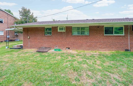 back yard, back of duplex, duplex unit for sale