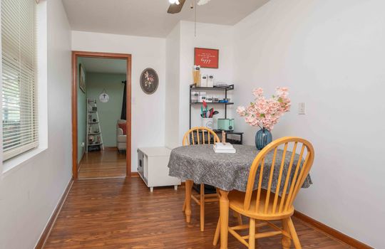 dining space, hardwood flooring, ceiling fan