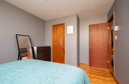 second bedroom, closet, hardwood flooring