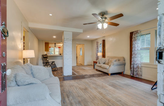 living room, ceiling fan, hardwood flooring, windwos