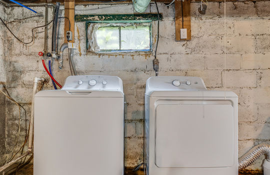 laundry area, basement, unfinished basement