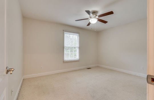 third bedroom, carpet, ceiling fan, window