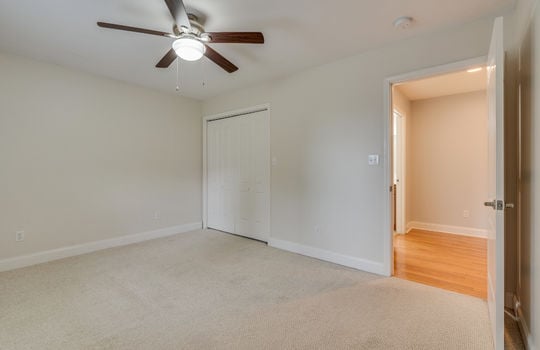 third bedroom, closet, ceiling fan, carpet