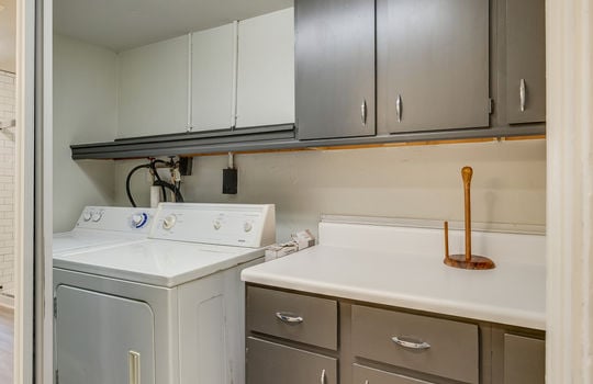 laundry area, cabinets/countertops