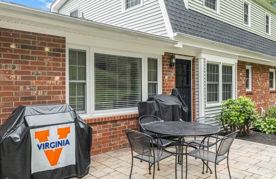 back of home, dutch colonial, patio, brick, back door