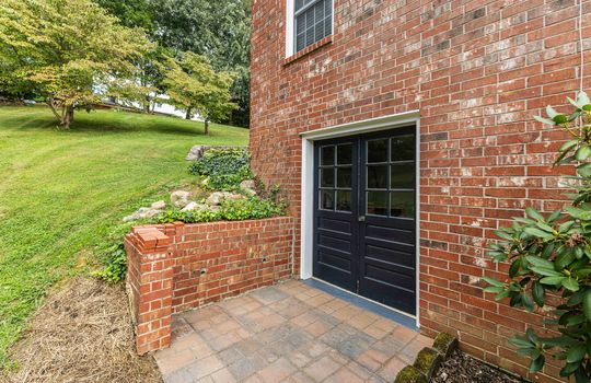 lower level entry doors, french doors, brick exterior