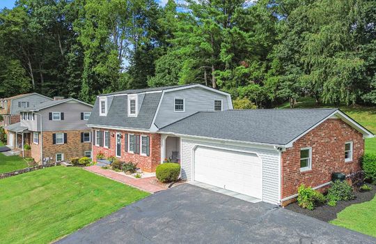 Brick, Dutch Colonial Home, driveway, garage, front door, front yard