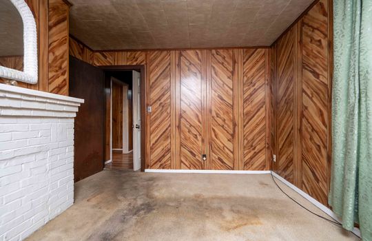 bedroom, carpet, paneling walls