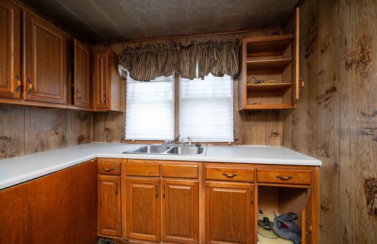 kitchen, cabinets, countertops, sink, window above sink