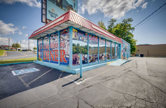 restaurant exterior, mural, parking spots, roof