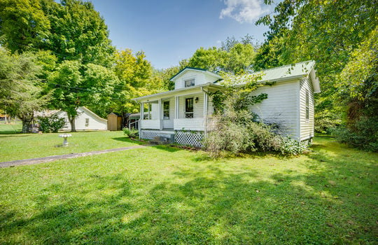 front of home, front porch, cottage, vinyl siding, front yard, trees