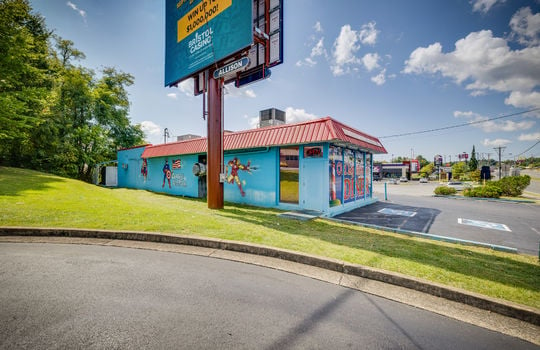 restaurant, wall mural, entrance, roof, parking spaces