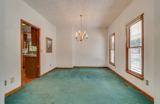 formal dining area, windows, carpet, door to kitchen