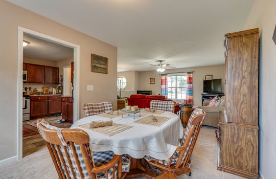 dining area, carpet, view toward living room, door to kitchen