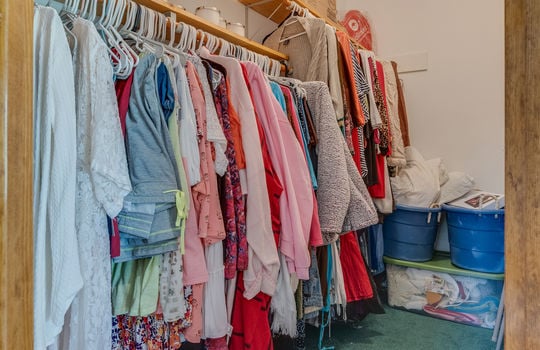 primary bedroom walk-in closet