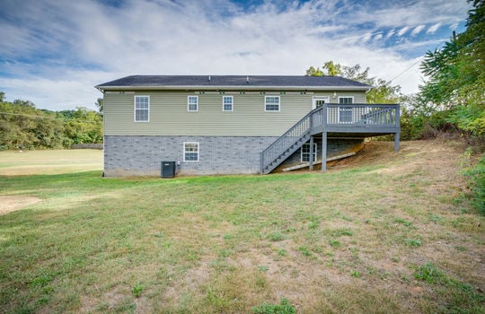 back yard, back of home, vinyl siding, back deck