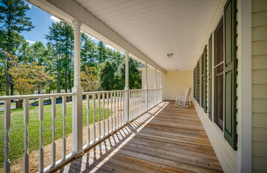 wrap around porch, railing, vinyl siding, windows