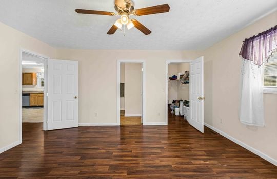 primary bedroom, walk-in closet, ceiling fan, ensuite bath