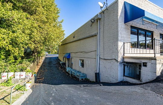 apartment entrance, glass doors, block building